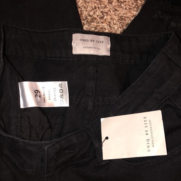 Black Distressed jeans with gold stars on right leg - Picture 3 of 7